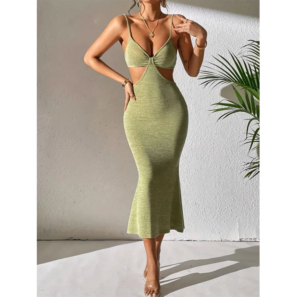 Rovelli green cutout bodycon dress with spaghetti straps, worn by woman indoors