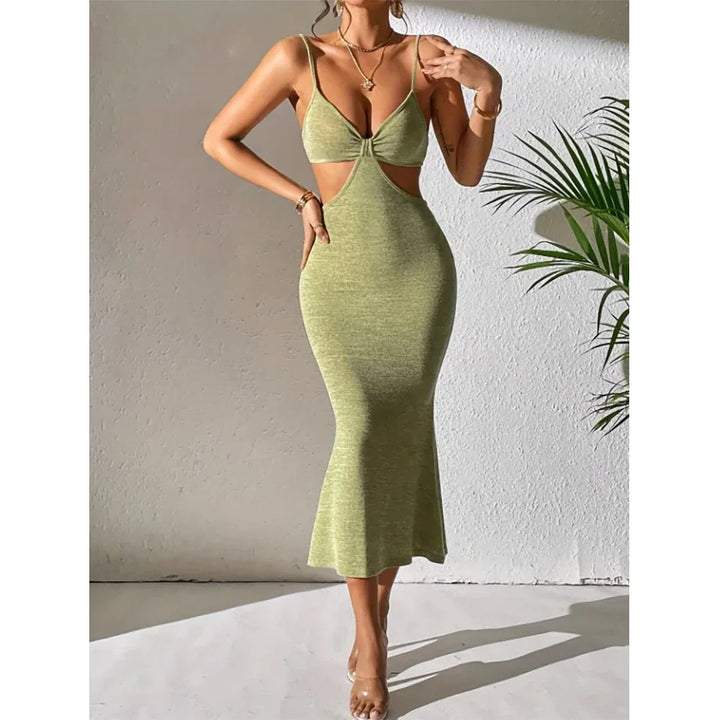 Rovelli green cutout bodycon dress with spaghetti straps, worn by woman indoors