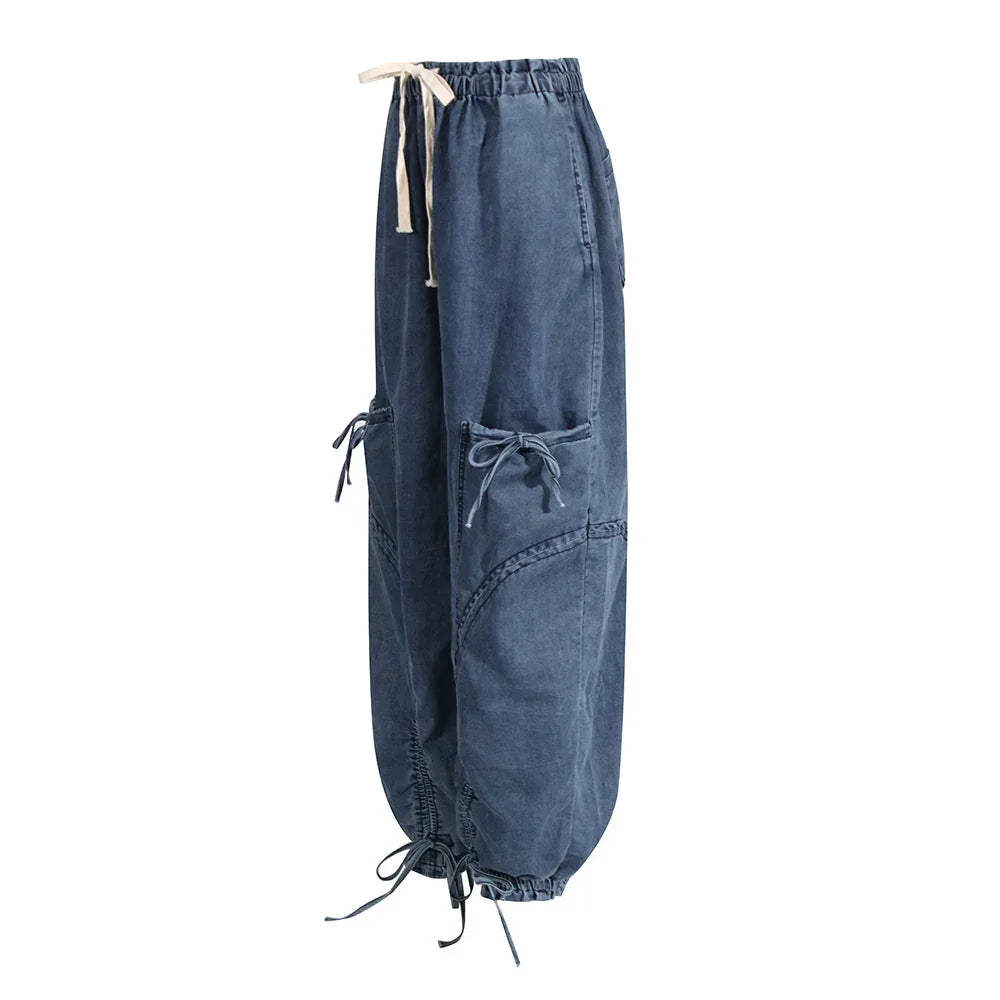 Rovelli blue denim cargo pants with elastic waist, side pockets, and adjustable ties