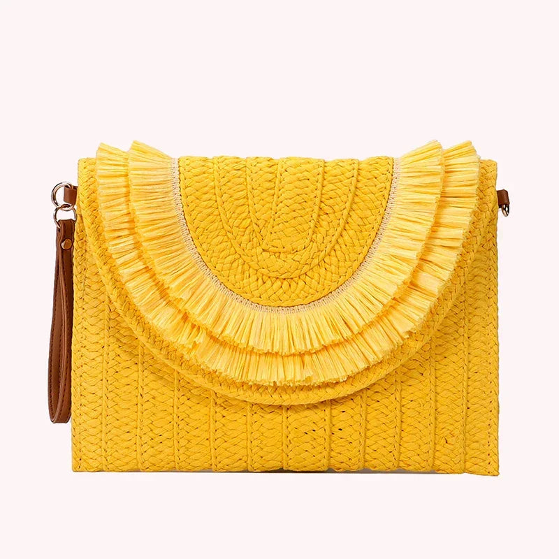 Yellow woven clutch bag with fringe detail and brown strap, Rovelli accessories