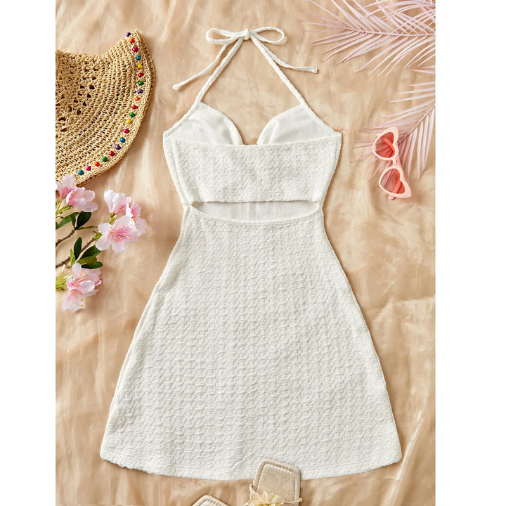 White textured halter dress with summer accessories, Rovelli fashion flat lay