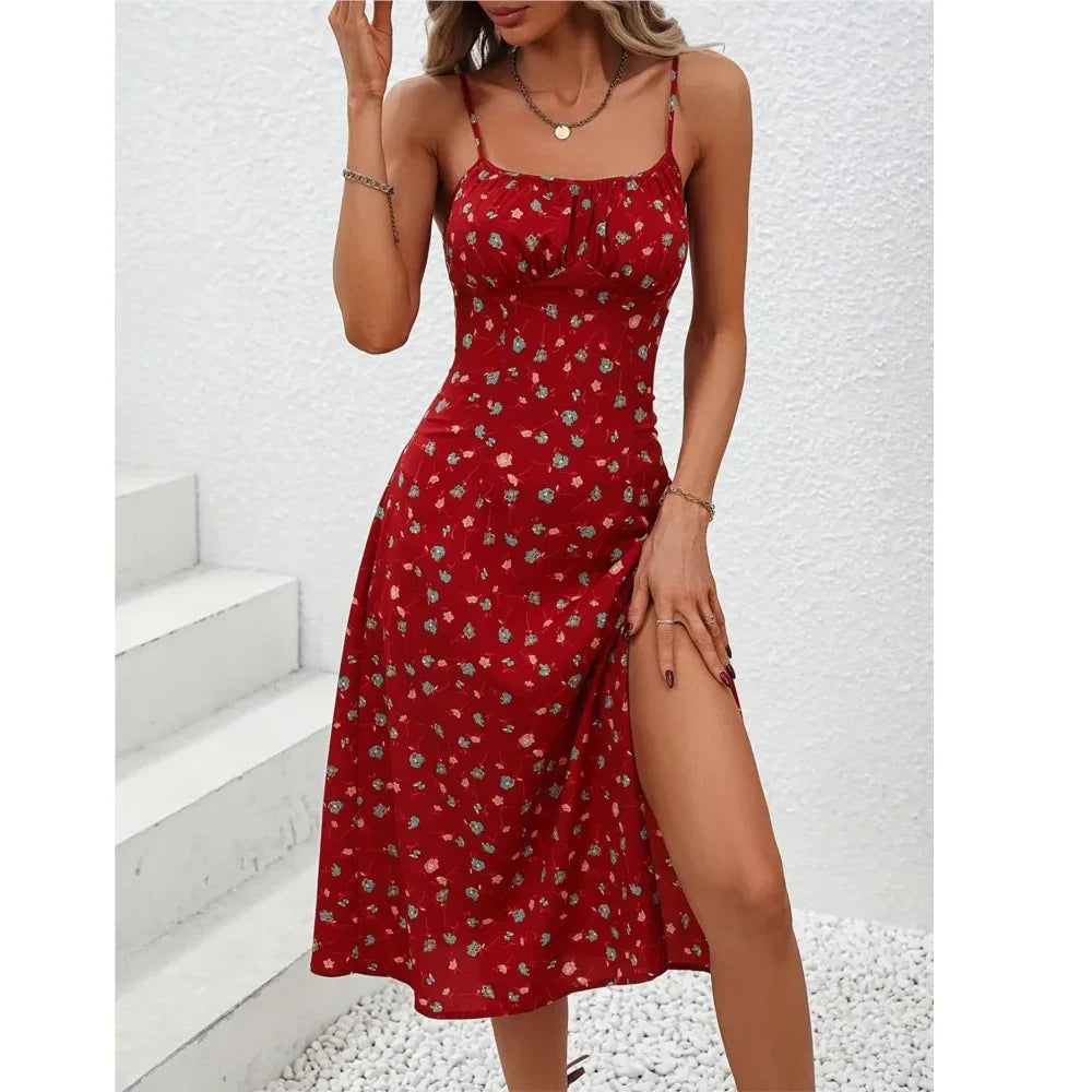 Woman wearing a red floral sleeveless dress with side slit, outdoor white background, Rovelli