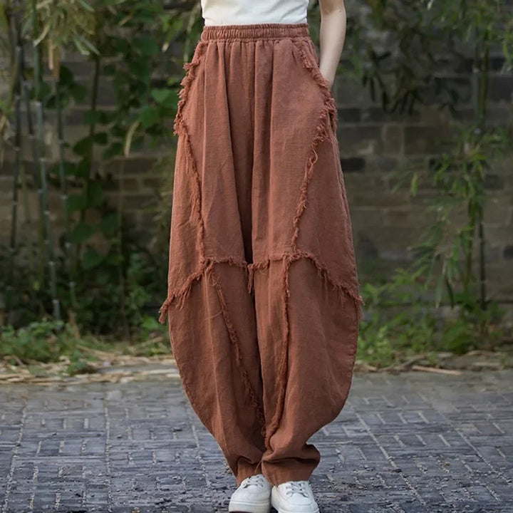 Rovelli brown wide leg linen pants with raw-edged seams, outdoor casual style