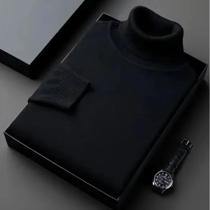 Rovelli black turtleneck sweater neatly folded in a gift box with a black watch nearby