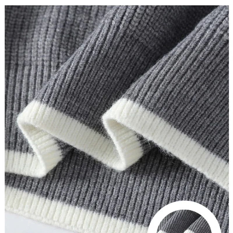 Rovelli gray and white ribbed knit sweater fabric close-up with striped detail
