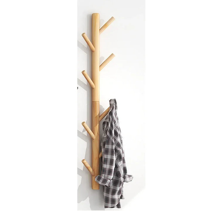 Wooden wall-mounted coat rack with branches design holding plaid shirt, Rovelli home decor