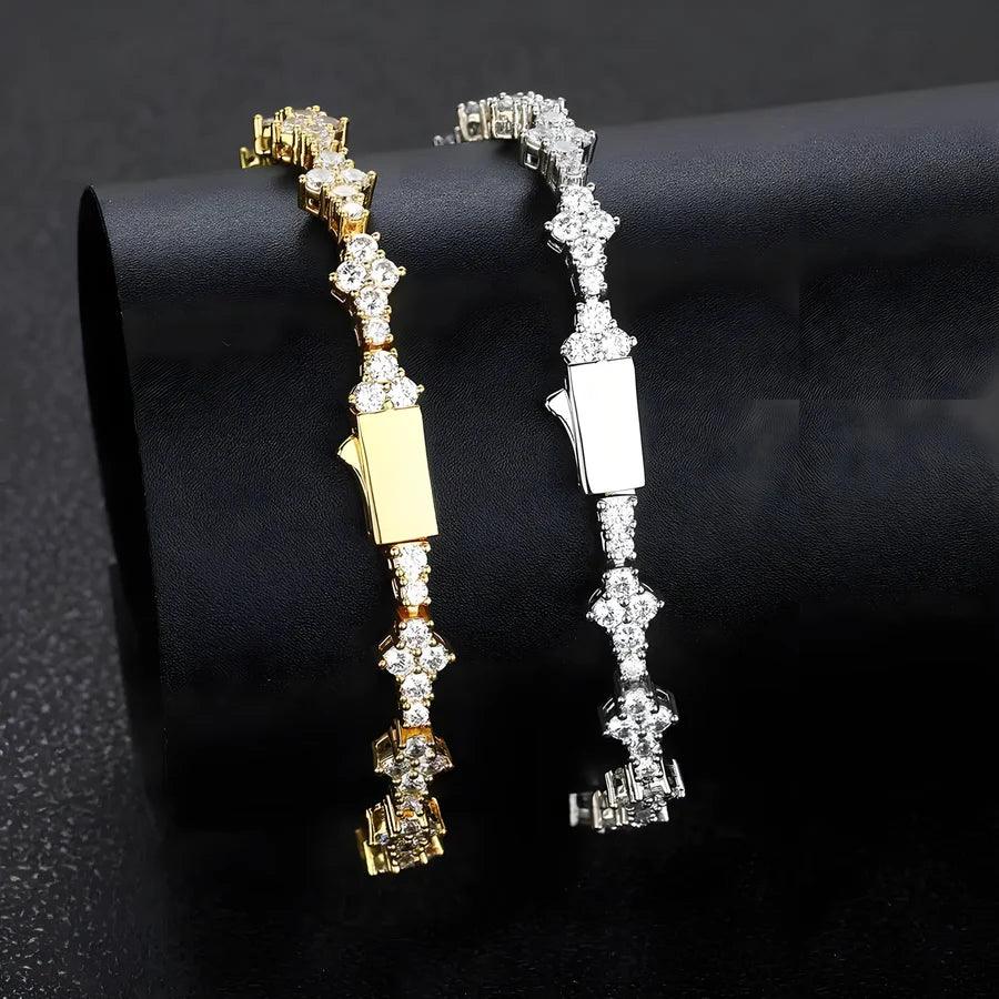 Gold and silver diamond tennis bracelets displayed on black background, Rovelli jewelry