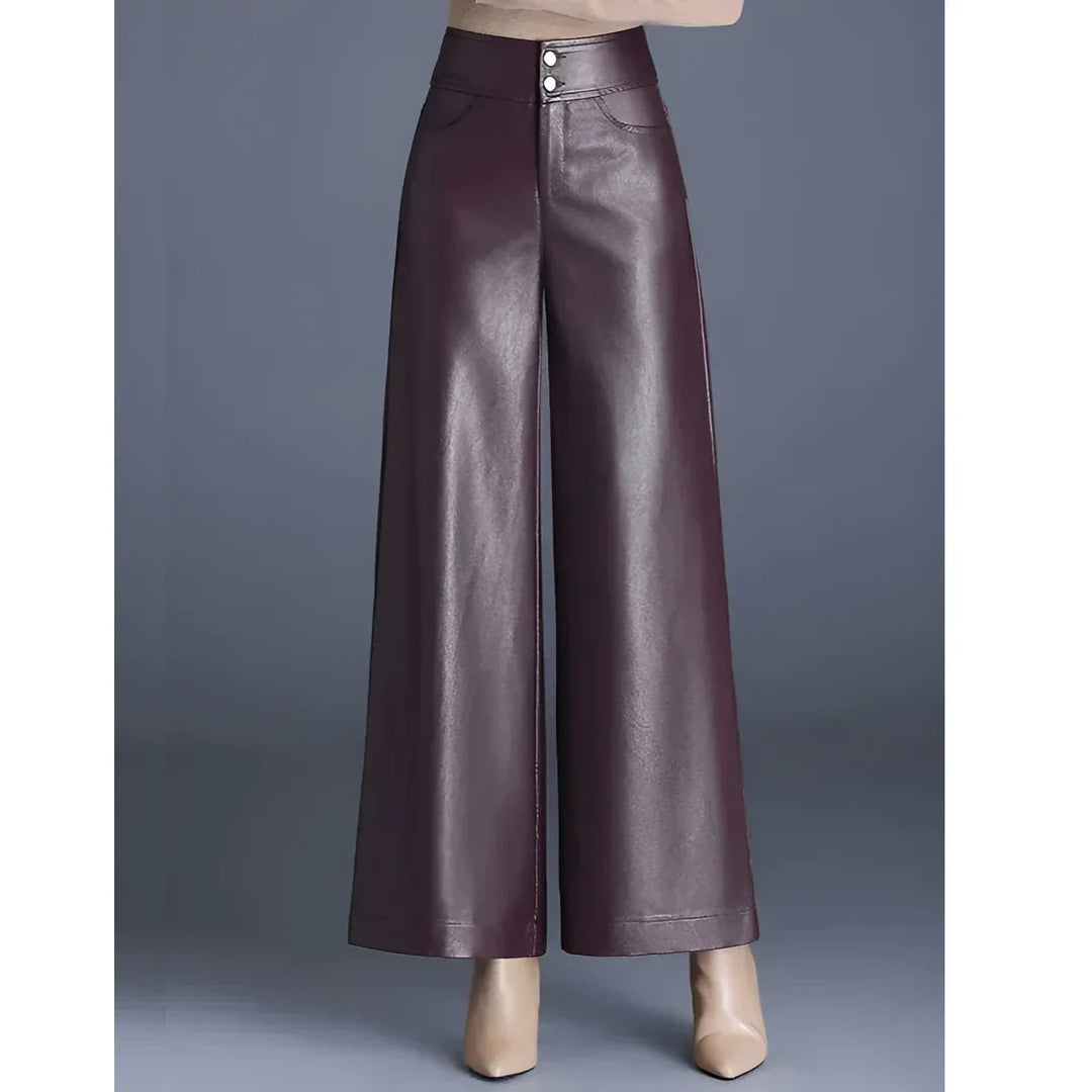 Rovelli wide-leg high-waist burgundy faux leather pants on grey background