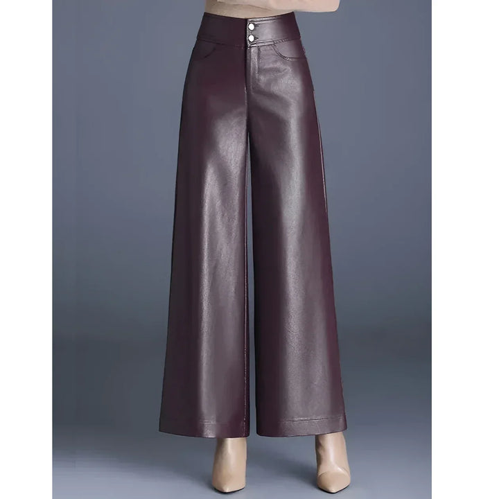 Rovelli wide-leg high-waist burgundy faux leather pants on grey background