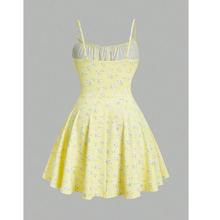 Yellow floral summer dress with spaghetti straps, fitted waist, Rovelli fashion style
