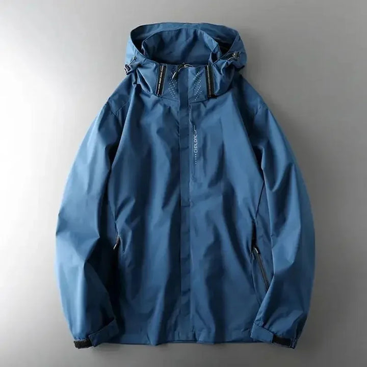 Rovelli blue waterproof hooded jacket with zip pockets on grey background