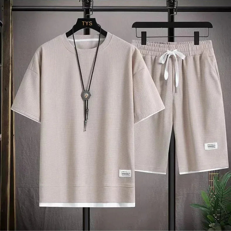 Rovelli beige short sleeve shirt and shorts lounge set with necklace on hanger