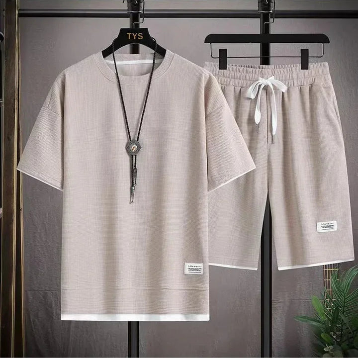 Rovelli beige short sleeve shirt and shorts lounge set with necklace on hanger