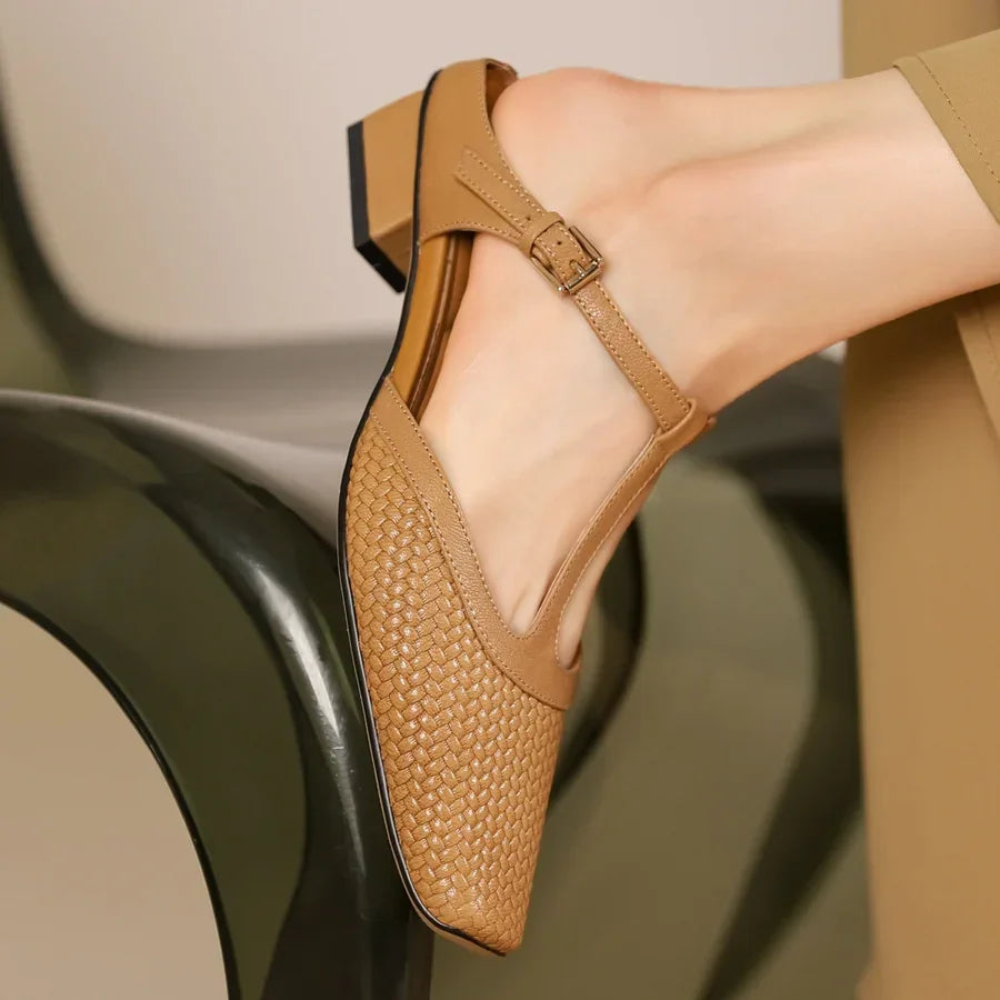Rovelli tan woven leather block heel Mary Jane shoe on modern chair