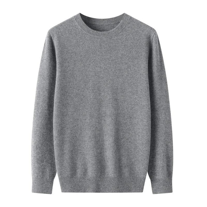 A plain, long-sleeved, light gray crewneck sweater made of soft knit fabric and showcasing fine wool craftsmanship, displayed on a white background.