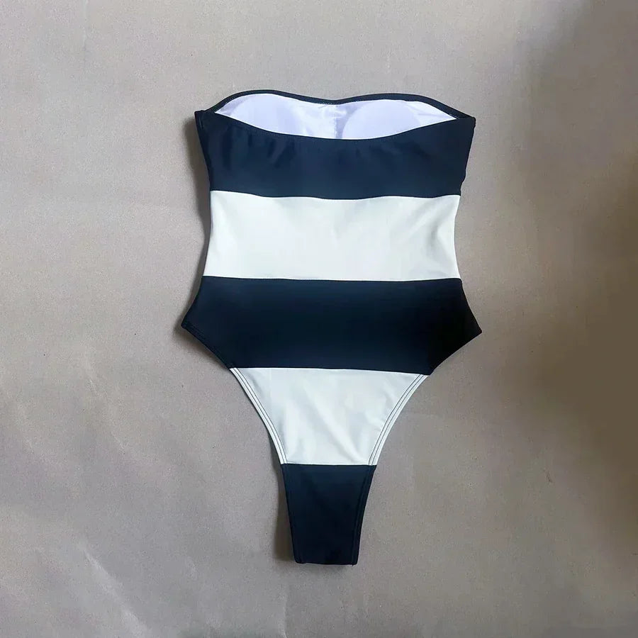 Rovelli black and white striped one-piece swimsuit on neutral background