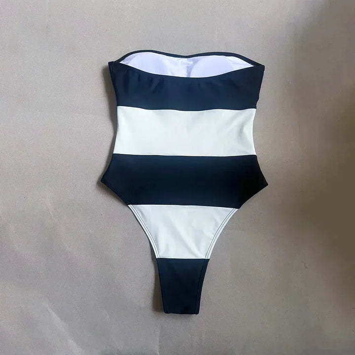 Rovelli black and white striped one-piece swimsuit on neutral background