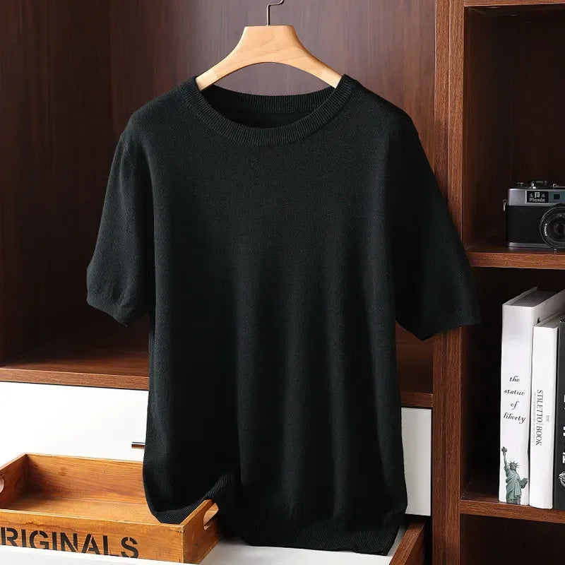 Rovelli black short sleeve knit t-shirt on hanger in wooden shelf display