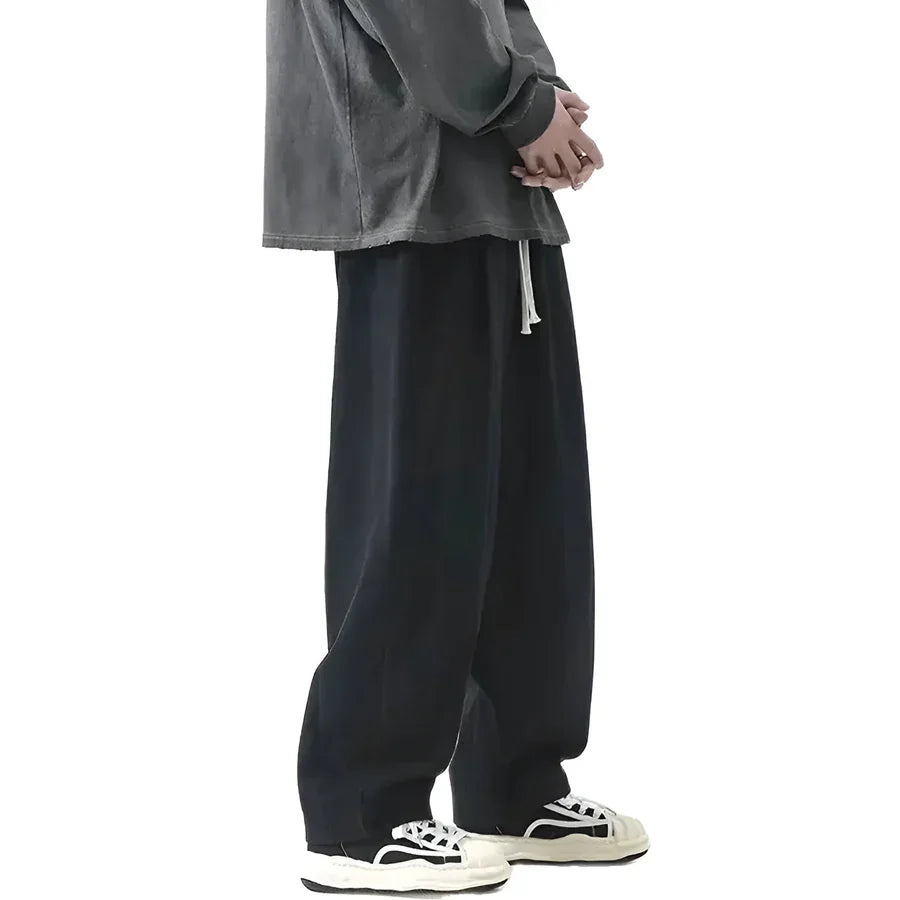 Rovelli relaxed fit black wide leg pants with drawstring and sneakers