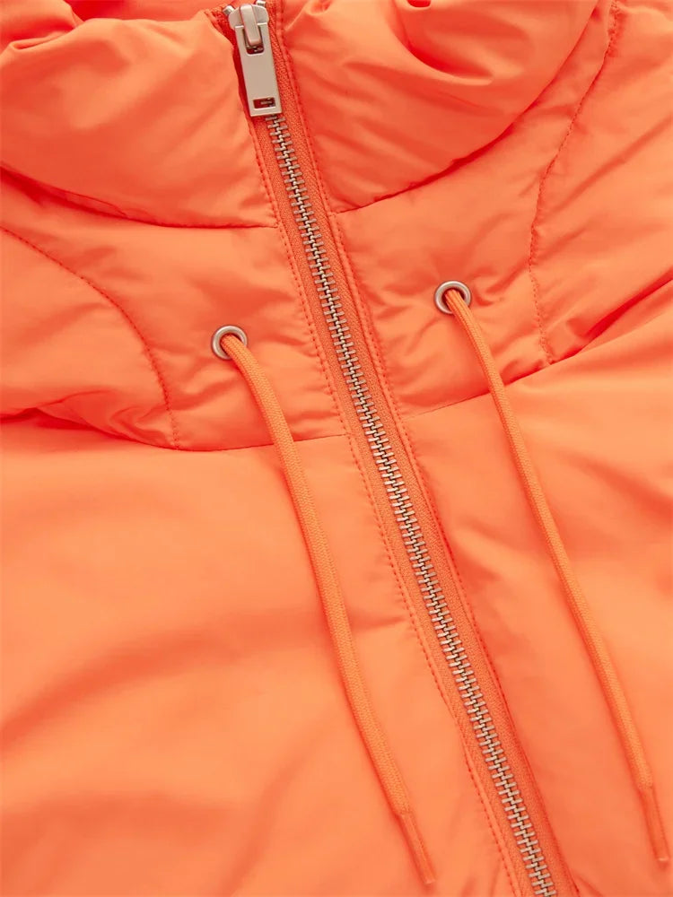 Close-up of an orange puffer jacket featuring a silver zipper and two drawstrings on either side, crafted from durable material with visible stitching and a high, padded collar.