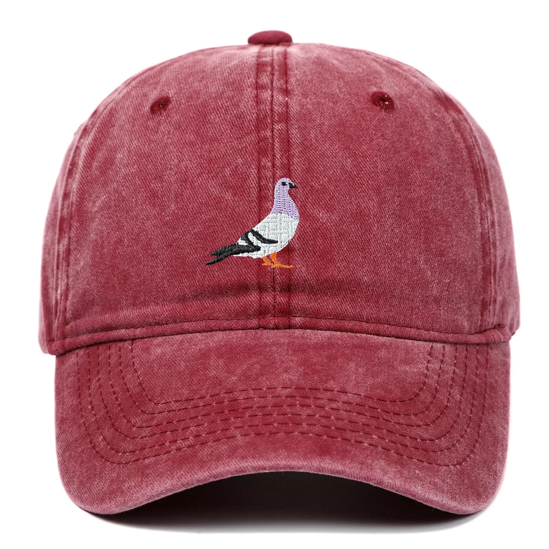 Rovelli red washed baseball cap with embroidered pigeon design on front