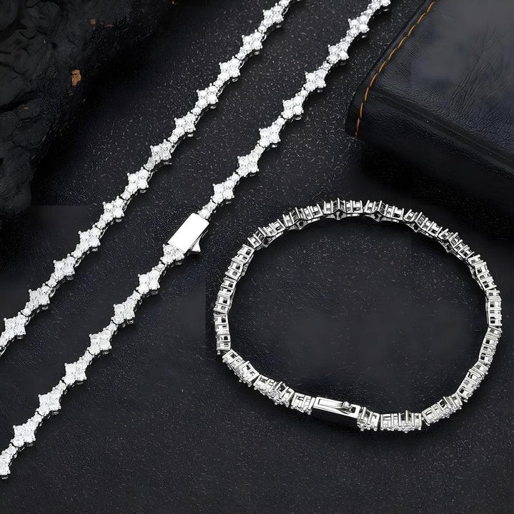 Rovelli diamond tennis bracelet and necklace set on black leather background