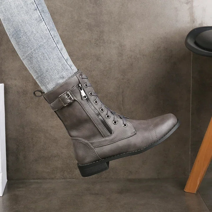 Rovelli gray lace-up ankle boot with side zipper and buckle, worn with light jeans