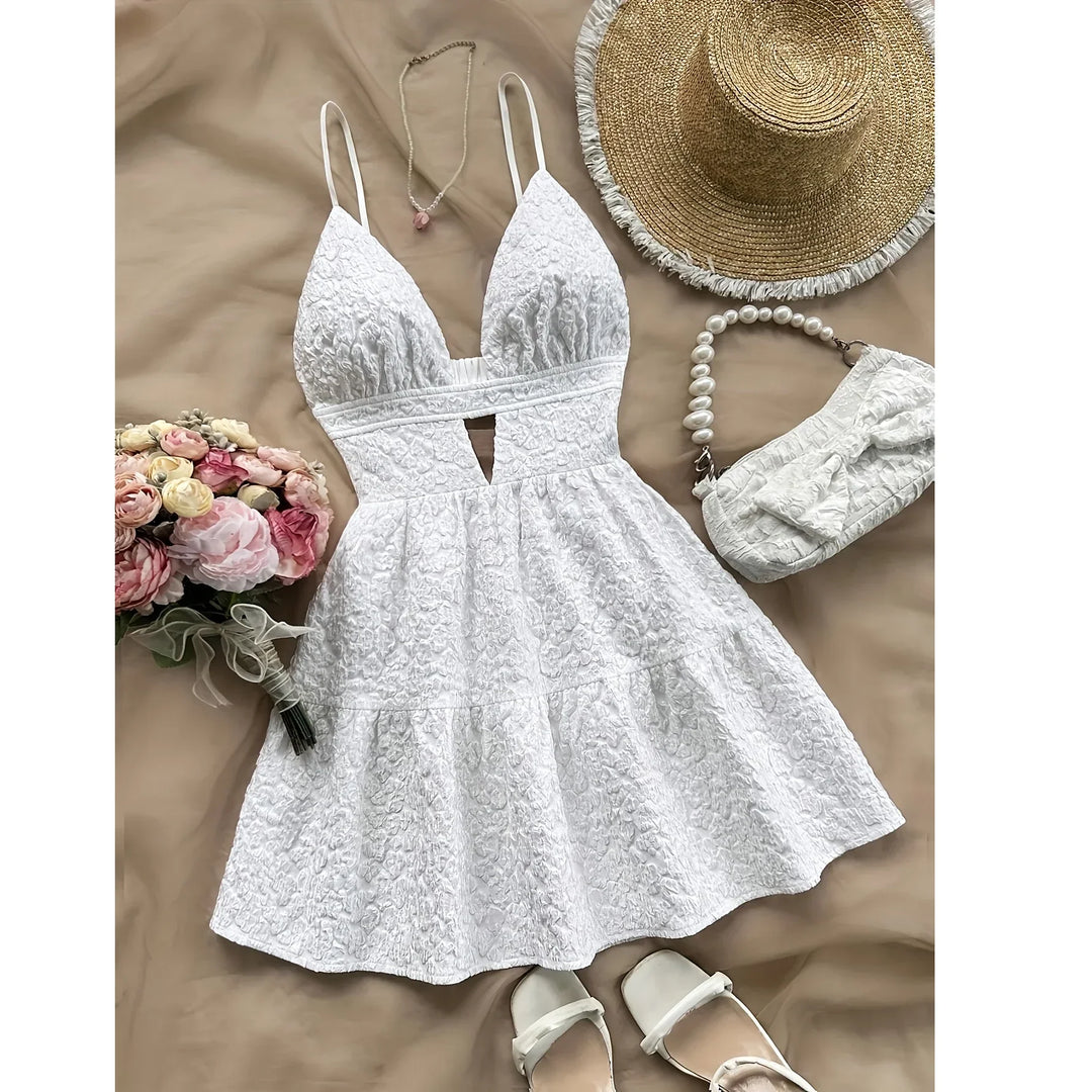 White lace summer dress flat lay with straw hat, pearl bag, sandals, necklace, bouquet by Rovelli