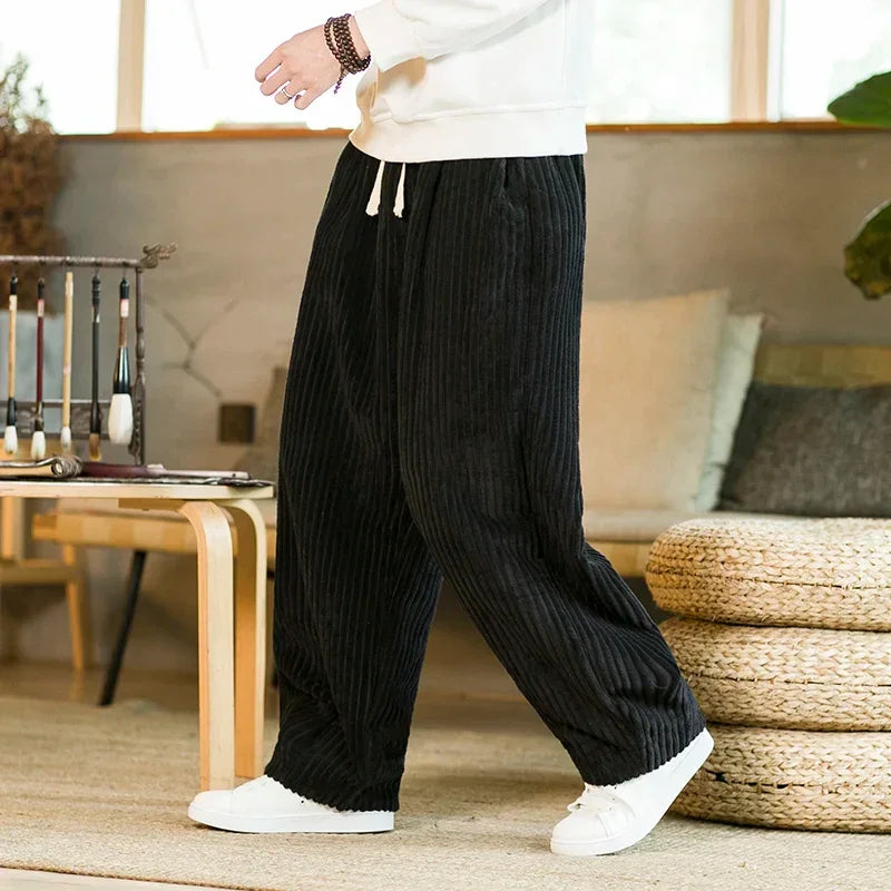 Rovelli black corduroy wide-leg pants with drawstring, relaxed fit, cozy home setting