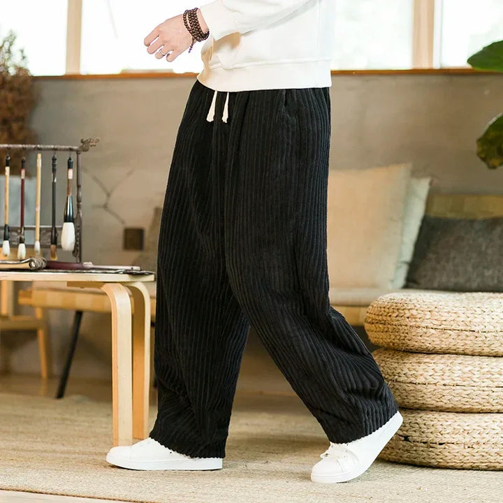 Rovelli black corduroy wide-leg pants with drawstring, relaxed fit, cozy home setting