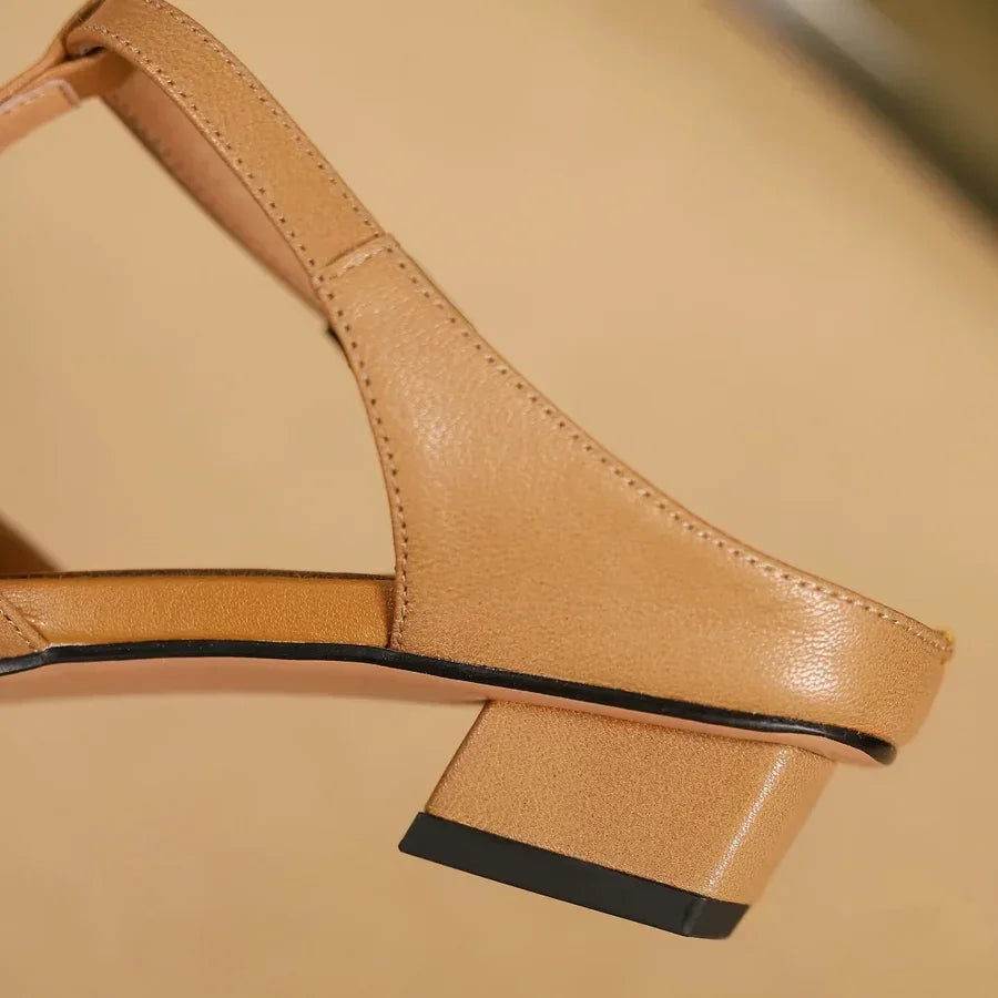 Rovelli tan leather sandal with low block heel and stitching detail, close-up