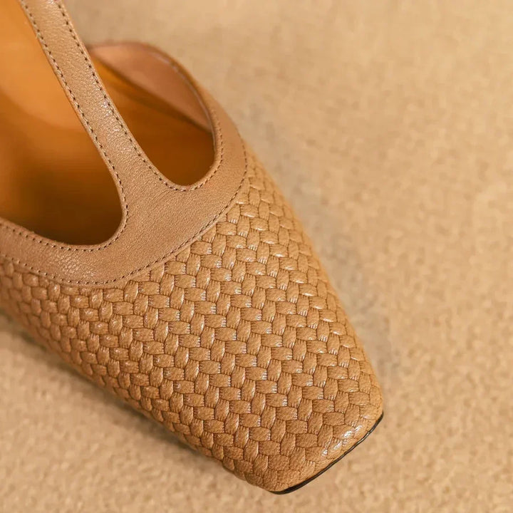 Rovelli tan woven leather T-strap shoe on beige textured surface
