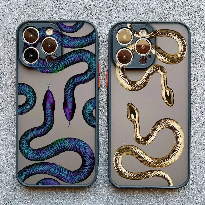Rovelli iPhone cases with snake designs, one iridescent blue and one metallic gold on textured background