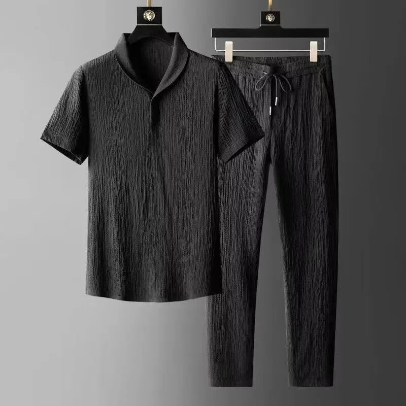 Rovelli black textured short sleeve shirt and drawstring pants set on hangers