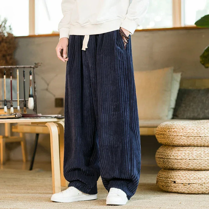 Rovelli navy corduroy wide-leg pants with drawstring, casual indoor setting