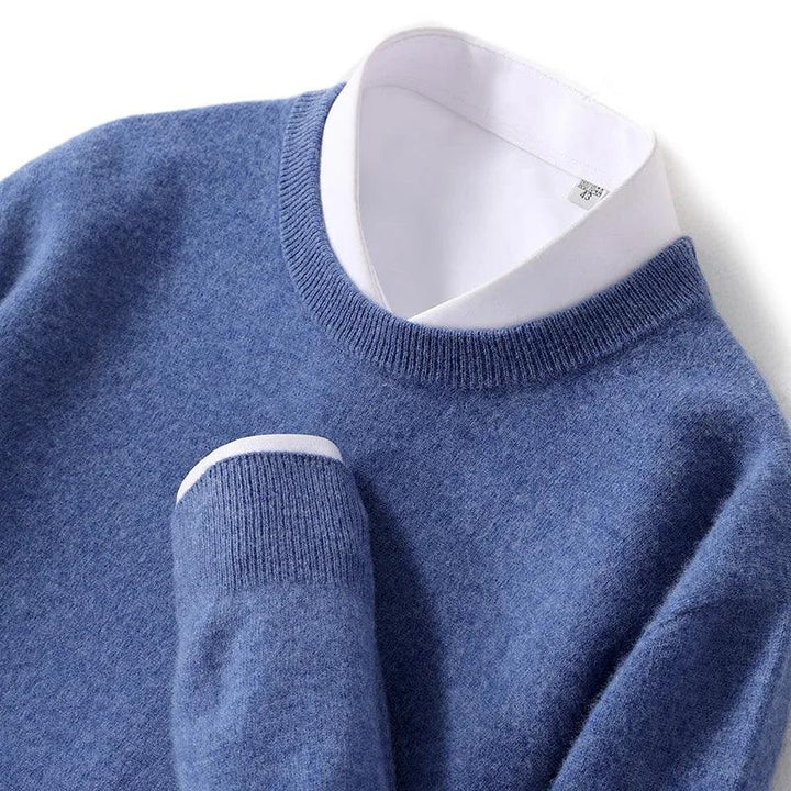Blue crew neck sweater layered over white dress shirt, Rovelli clothing style
