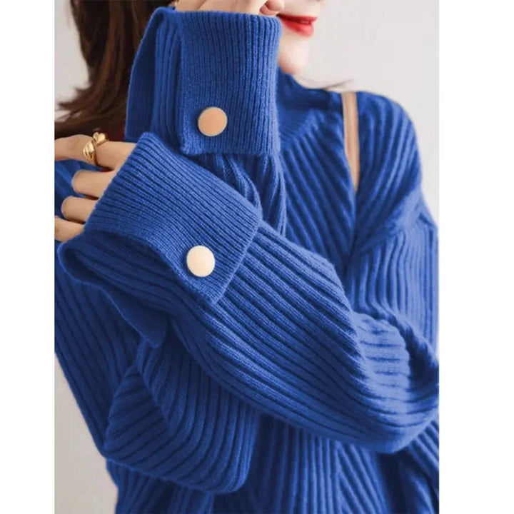 Rovelli blue ribbed knit sweater with oversized sleeves and gold button details