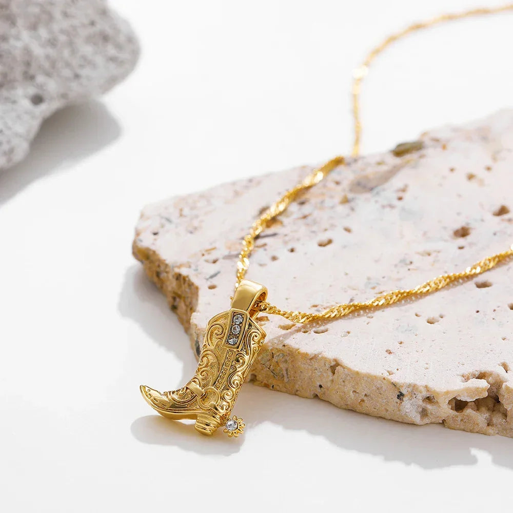 Gold cowboy boot pendant necklace with crystal accents on stone, Rovelli jewelry