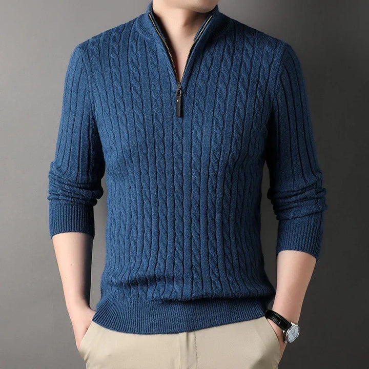 Man wearing a blue cable knit quarter-zip sweater by Rovelli, stylish casual fall fashion