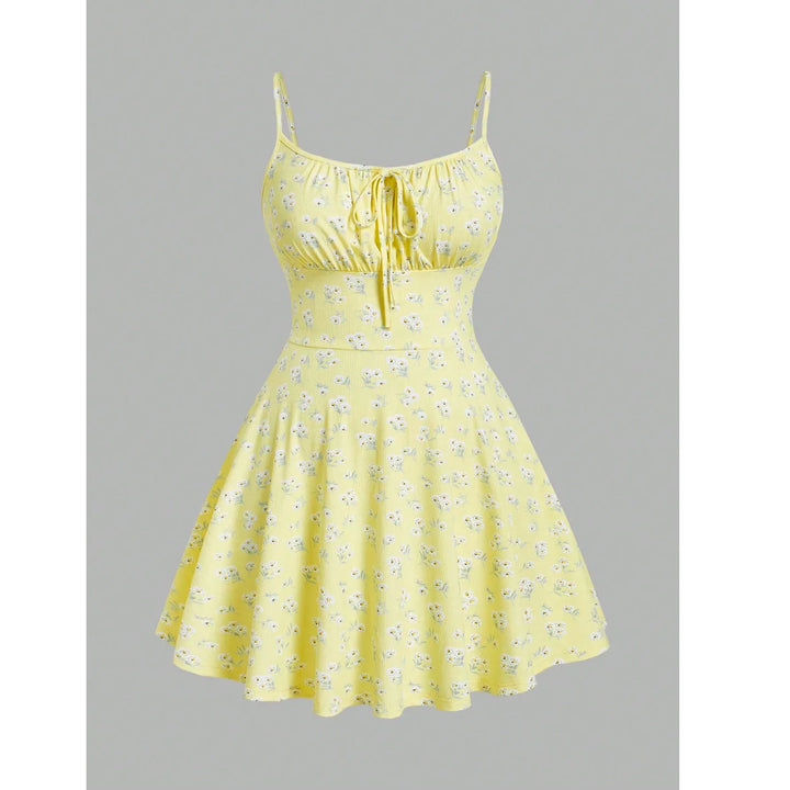 Yellow floral summer dress with spaghetti straps and ruched bust by Rovelli
