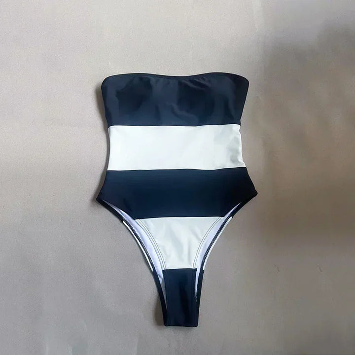 Rovelli black and white strapless striped one-piece swimsuit on neutral background