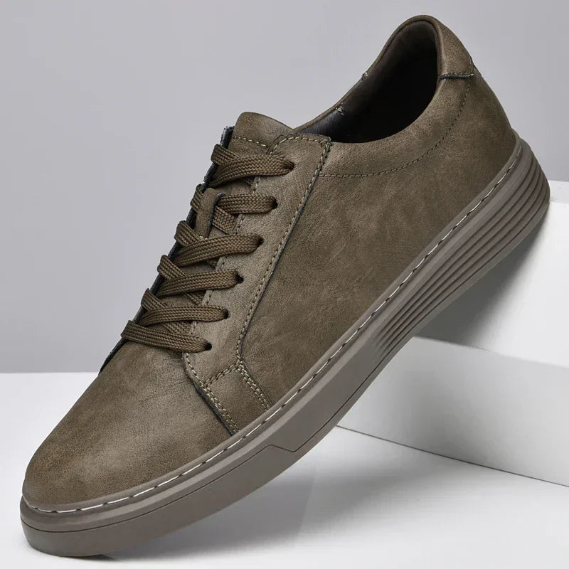 Rovelli brown casual sneaker with textured sole and brown laces on white background