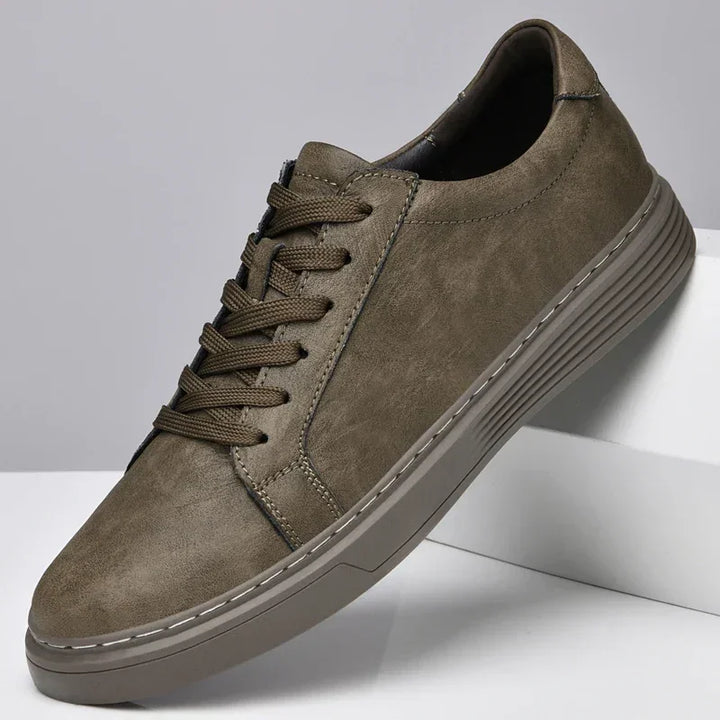 Rovelli brown casual sneaker with textured sole and brown laces on white background