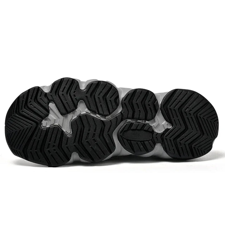 Rovelli black and grey sneaker sole with textured rubber grip pattern