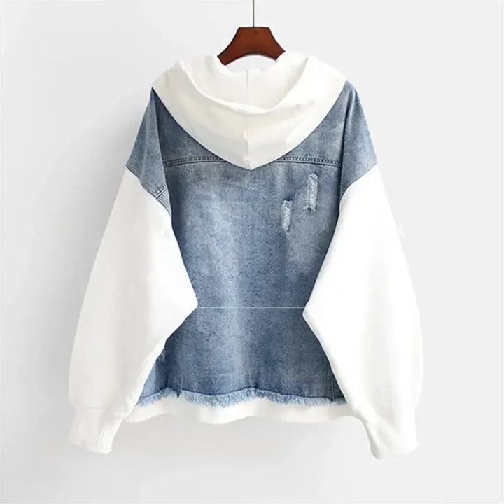 Rovelli denim and white hoodie jacket with distressed detailing, hanging on a wooden hanger