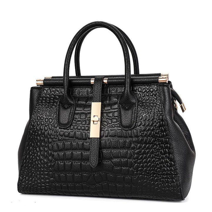 Rovelli black crocodile-embossed leather handbag with gold hardware