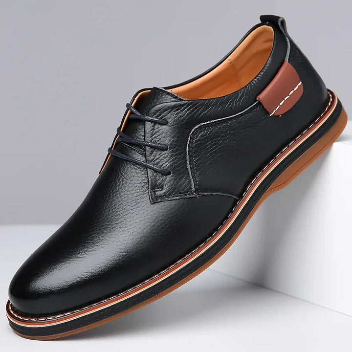 Rovelli black leather dress shoe with brown sole and lace-up design, stylish men's footwear