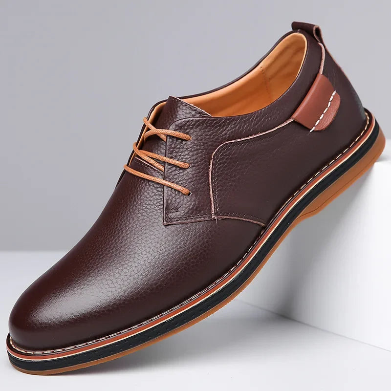Rovelli brown leather dress shoe with tan laces and textured finish, side view