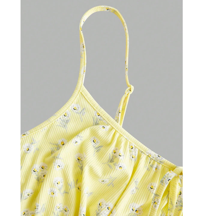 Rovelli yellow floral spaghetti strap dress with white daisy pattern on gray background