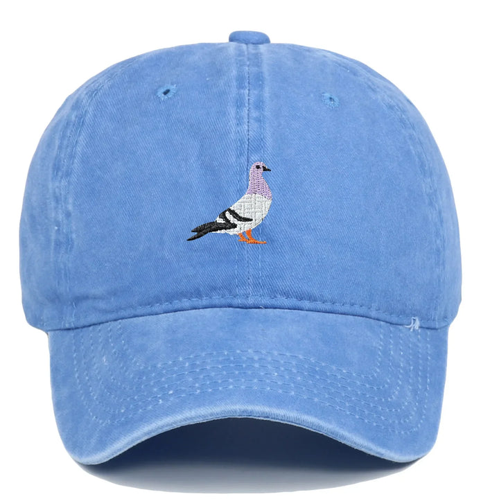 Blue Rovelli baseball cap with embroidered pigeon design on front.